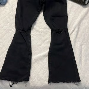 Black semi ripped flare jeans